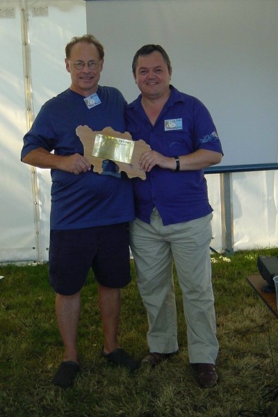 ../Images/Trev-G3ZTYY presenting the UKSMG Jersey trophy to Jimmy-W6JKV for his outstanding work to promote 6m through 6m DXpeditioning to 52 countries.jpg